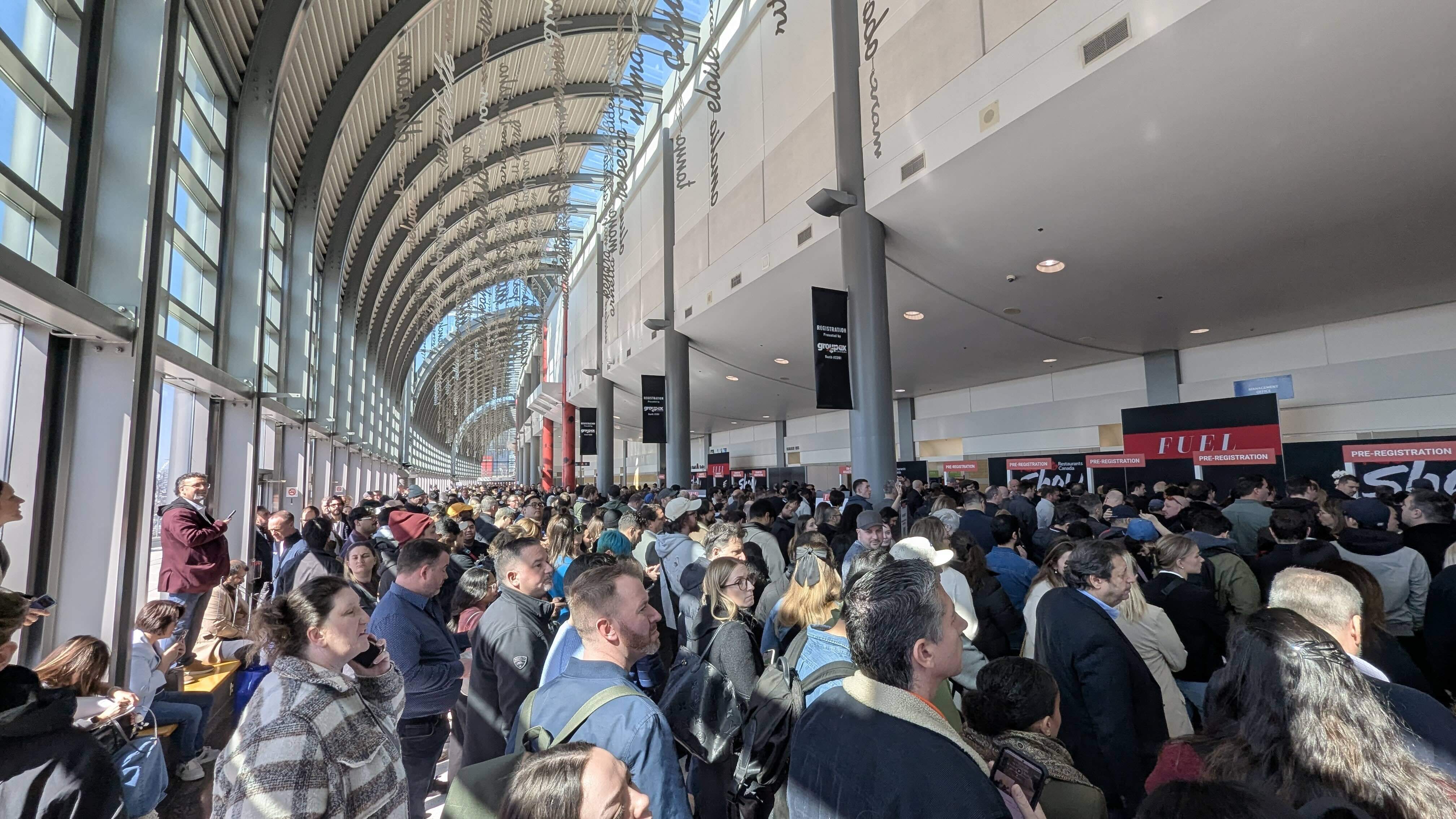 Crowd at the entrance to a trade show