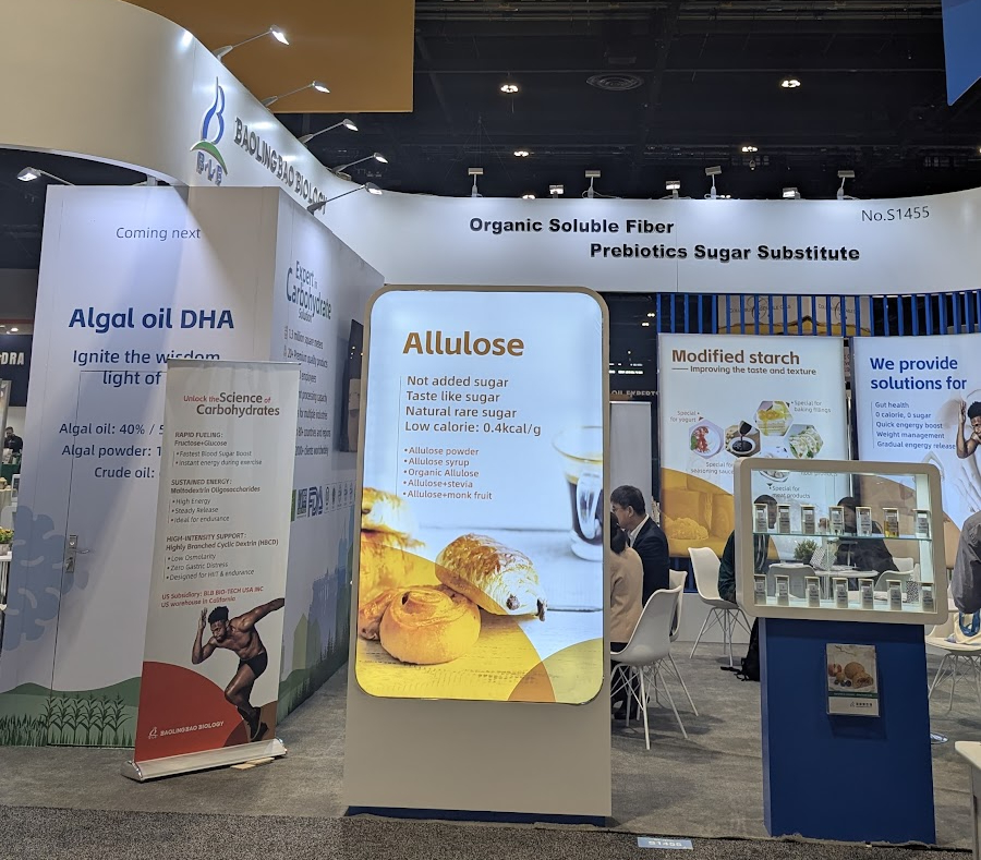 Busy signage at a trade show booth