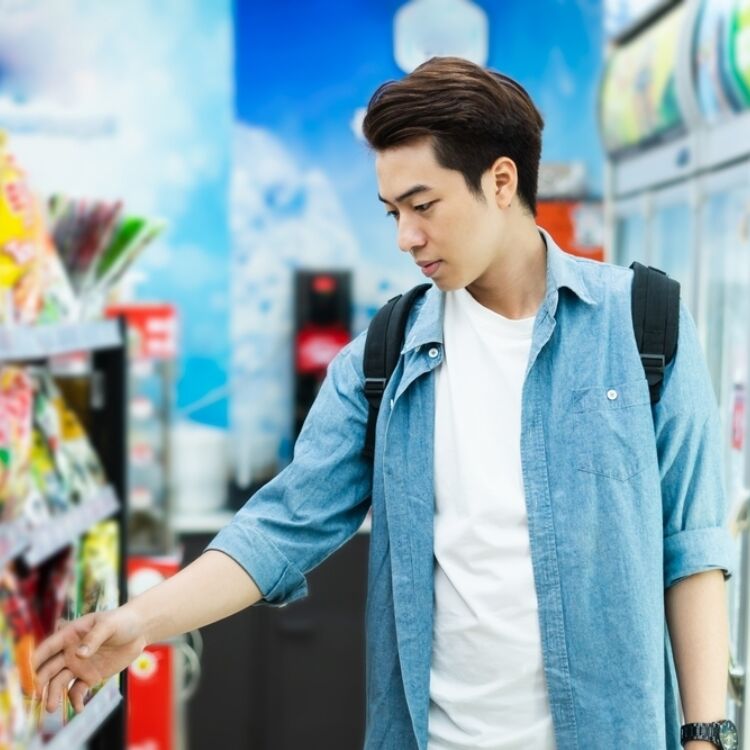 Young man shopping c store